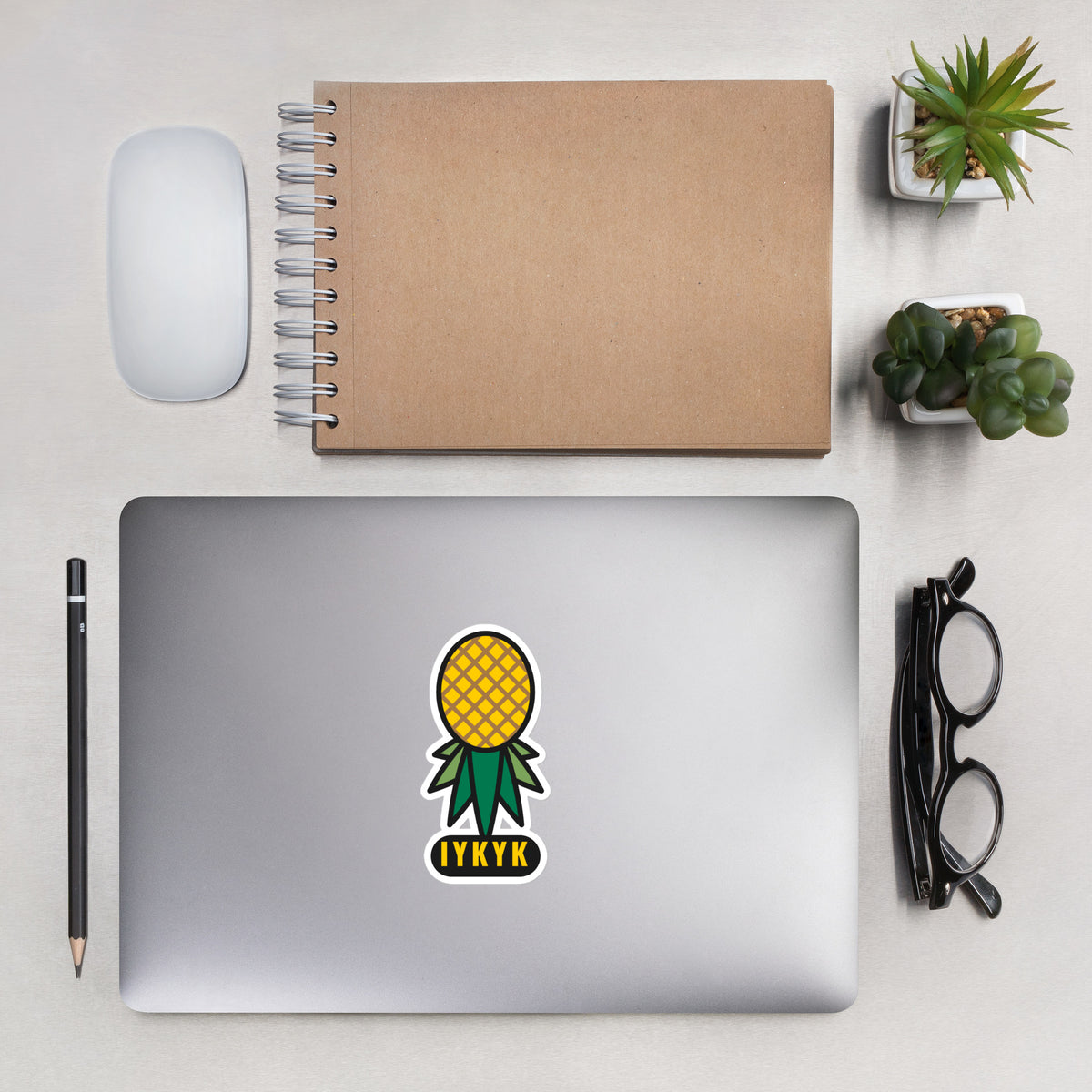 IYKYK upside-down pineapple sticker, 5.5 inch on a laptop