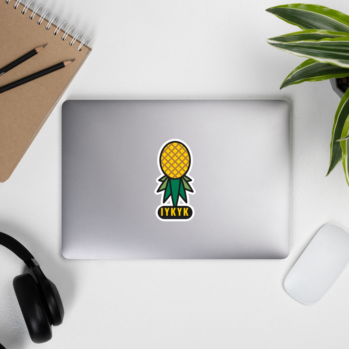 IYKYK upside-down pineapple sticker, 5.5 inch on a laptop