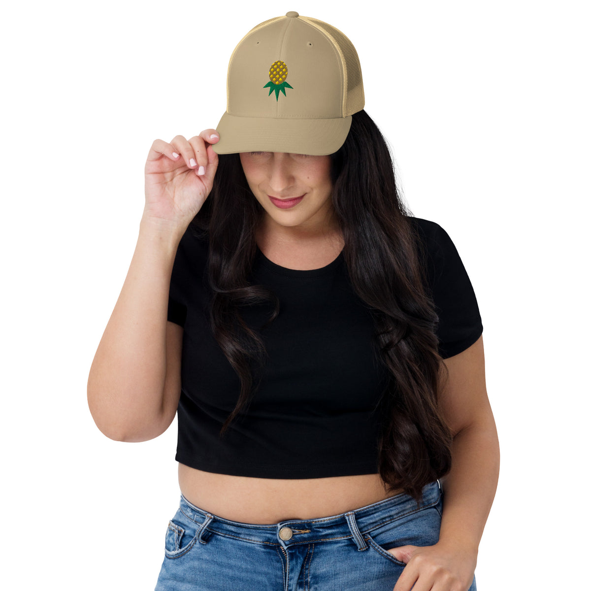 Khaki mesh-back trucker hat with embroidered upside-down pineapple, front view on model