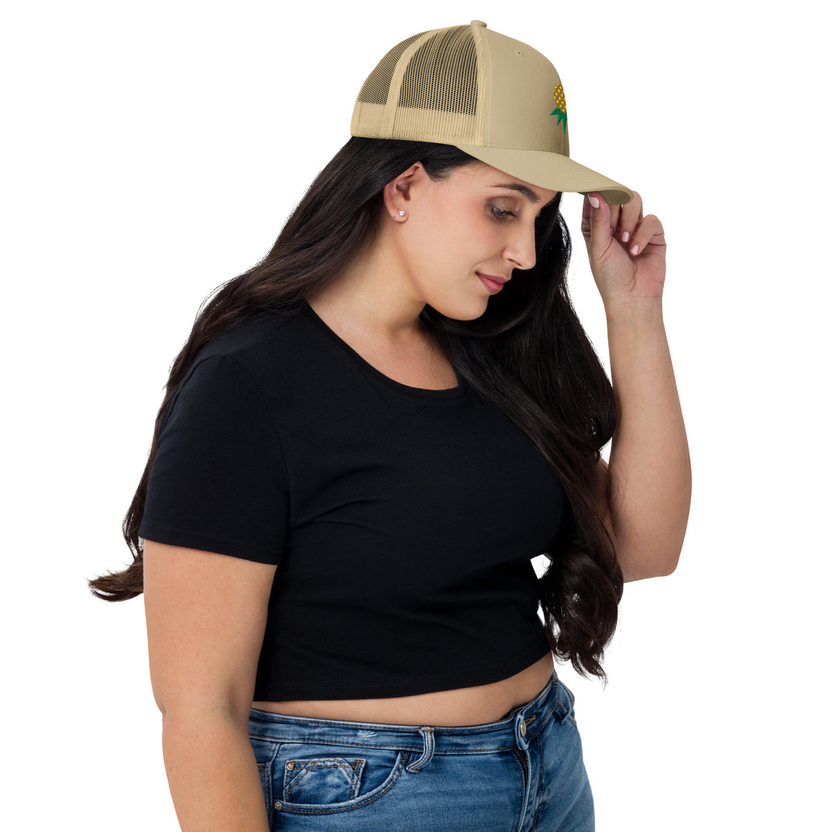 Khaki mesh-back trucker hat with embroidered upside-down pineapple, side view on model